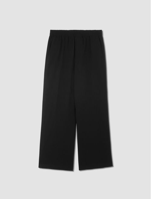 Trousers with elasticated band