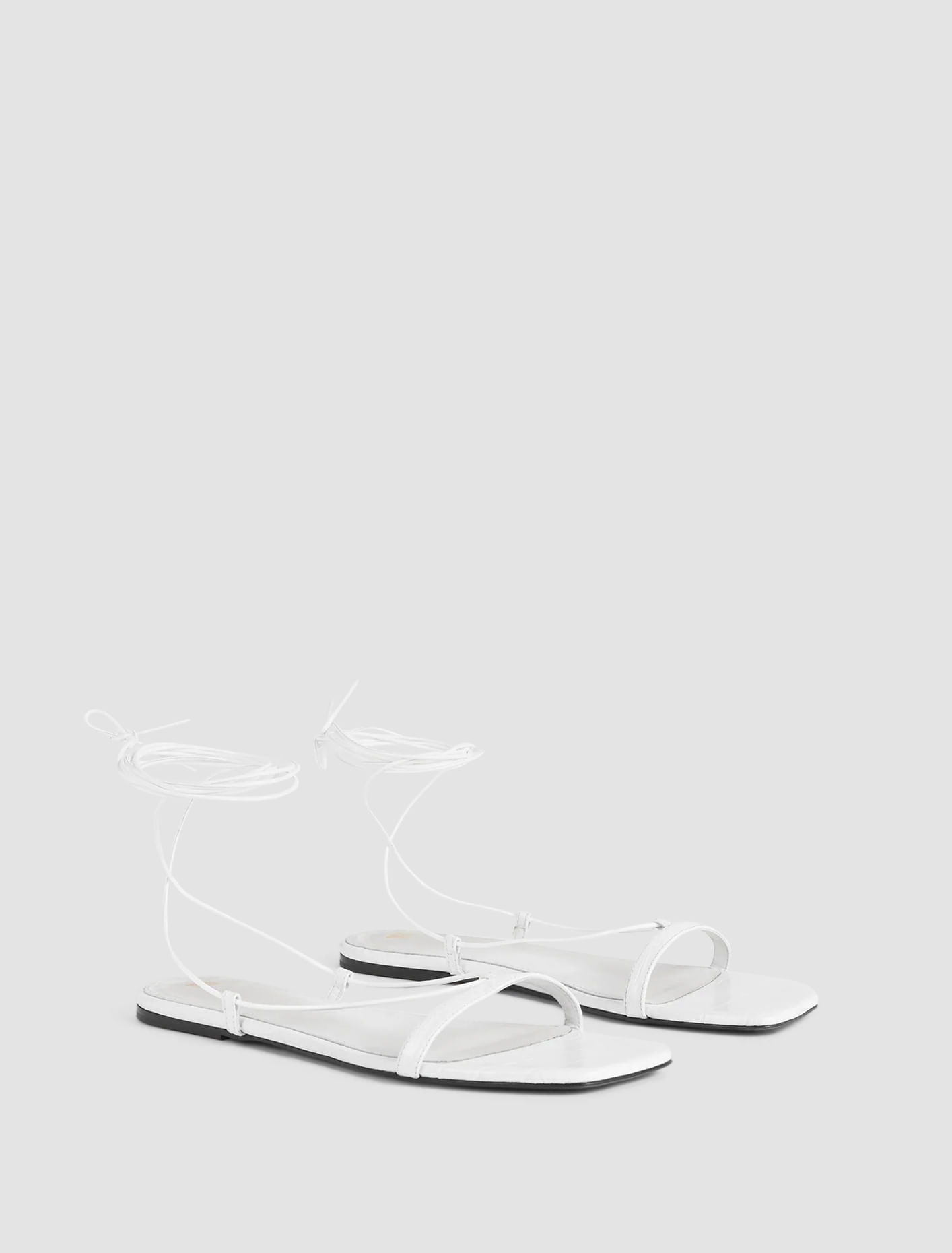 Shop Totême Croco Tie Sandal In White