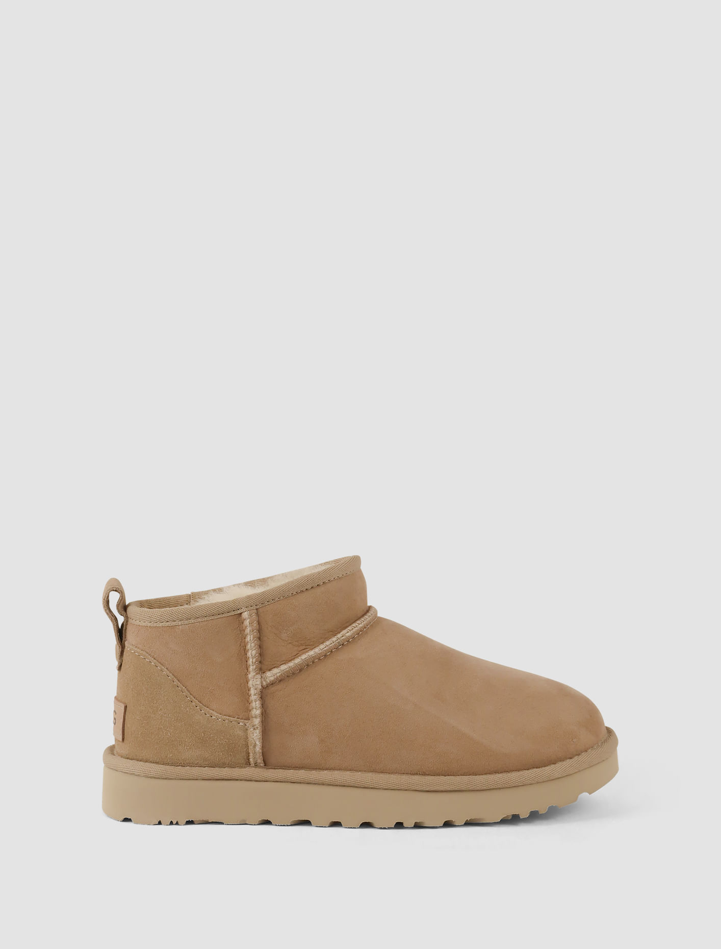 Shop Ugg Classic Ultra Mini Boots In Sand