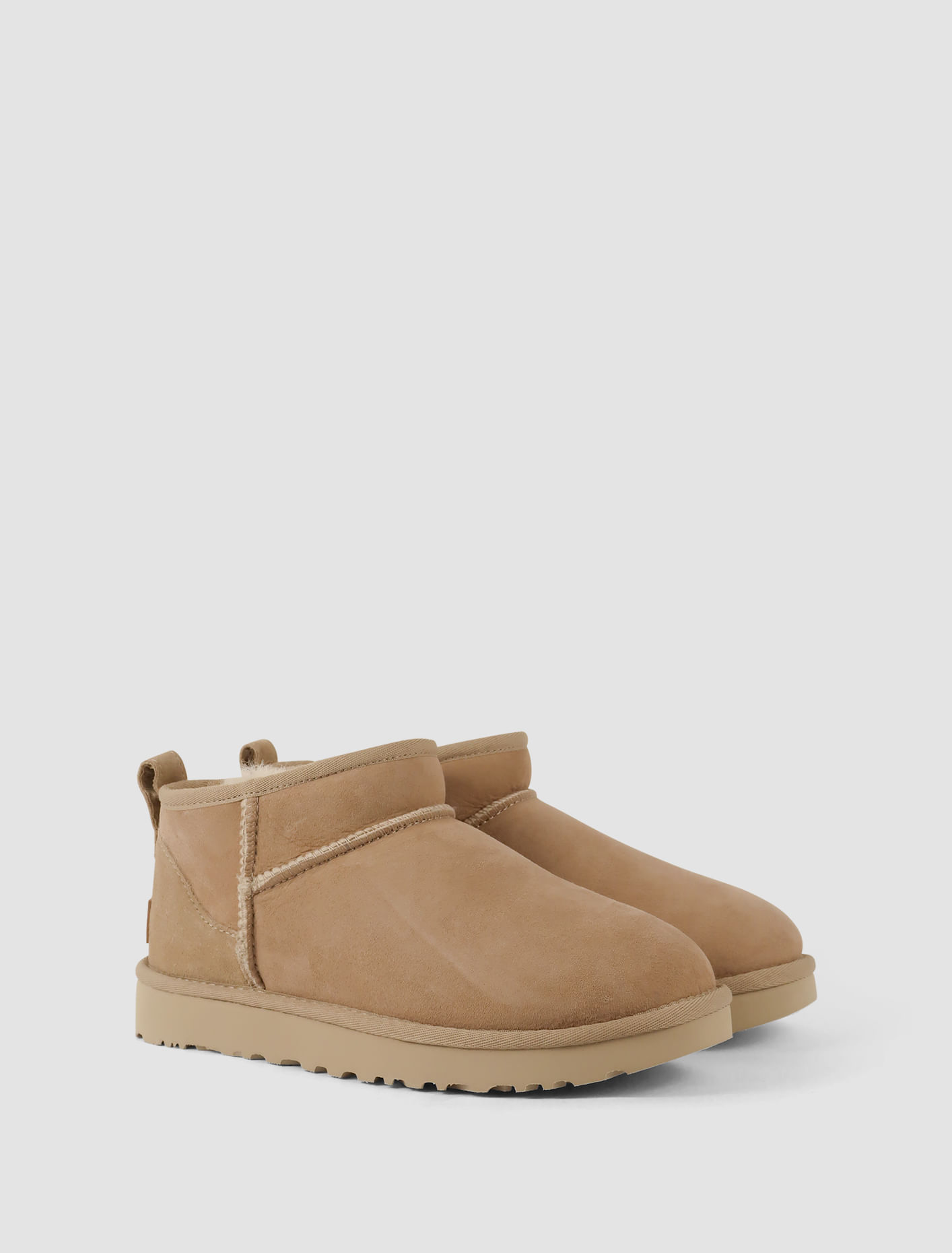 Shop Ugg Classic Ultra Mini Boots In Sand