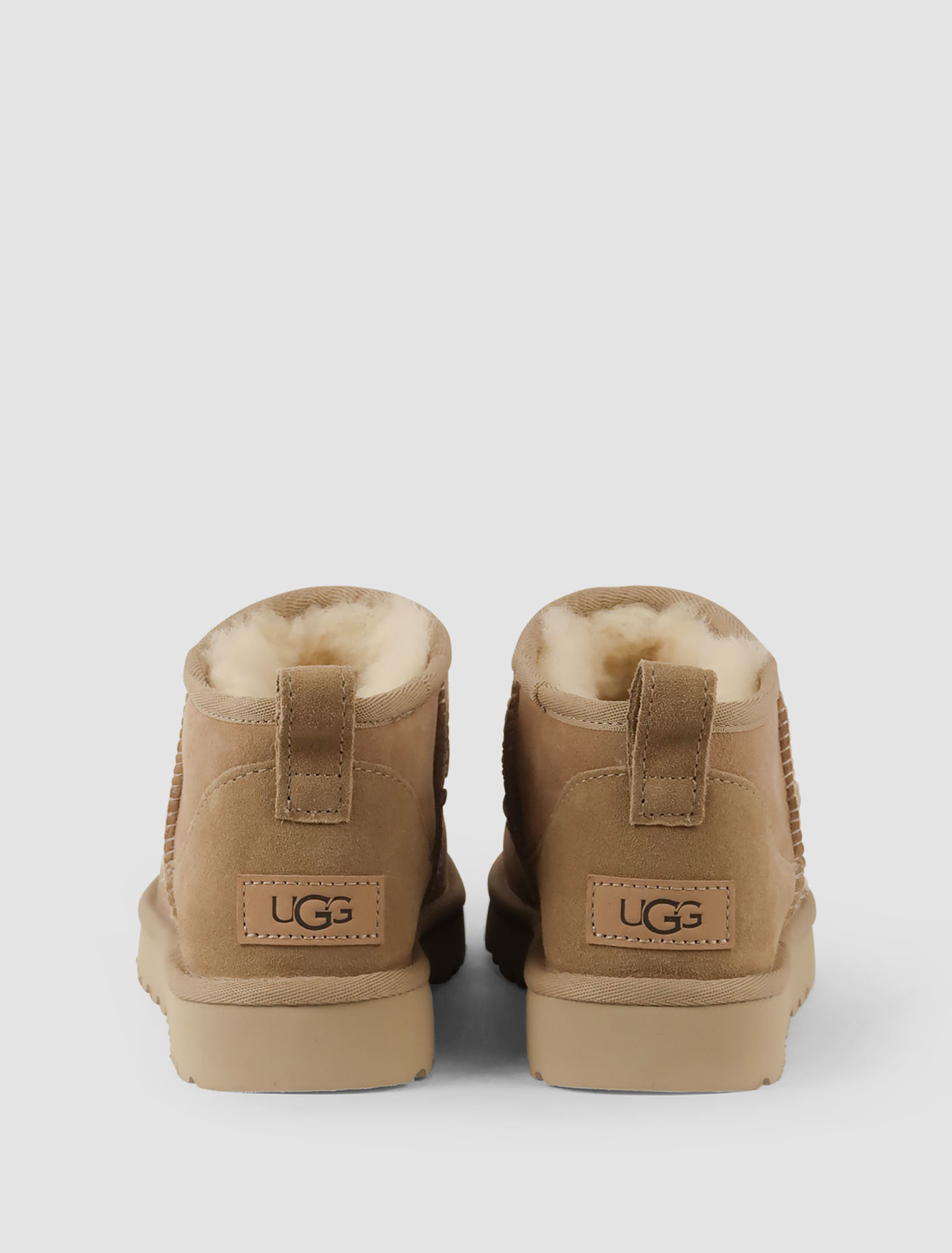 Shop Ugg Classic Ultra Mini Boots In Sand