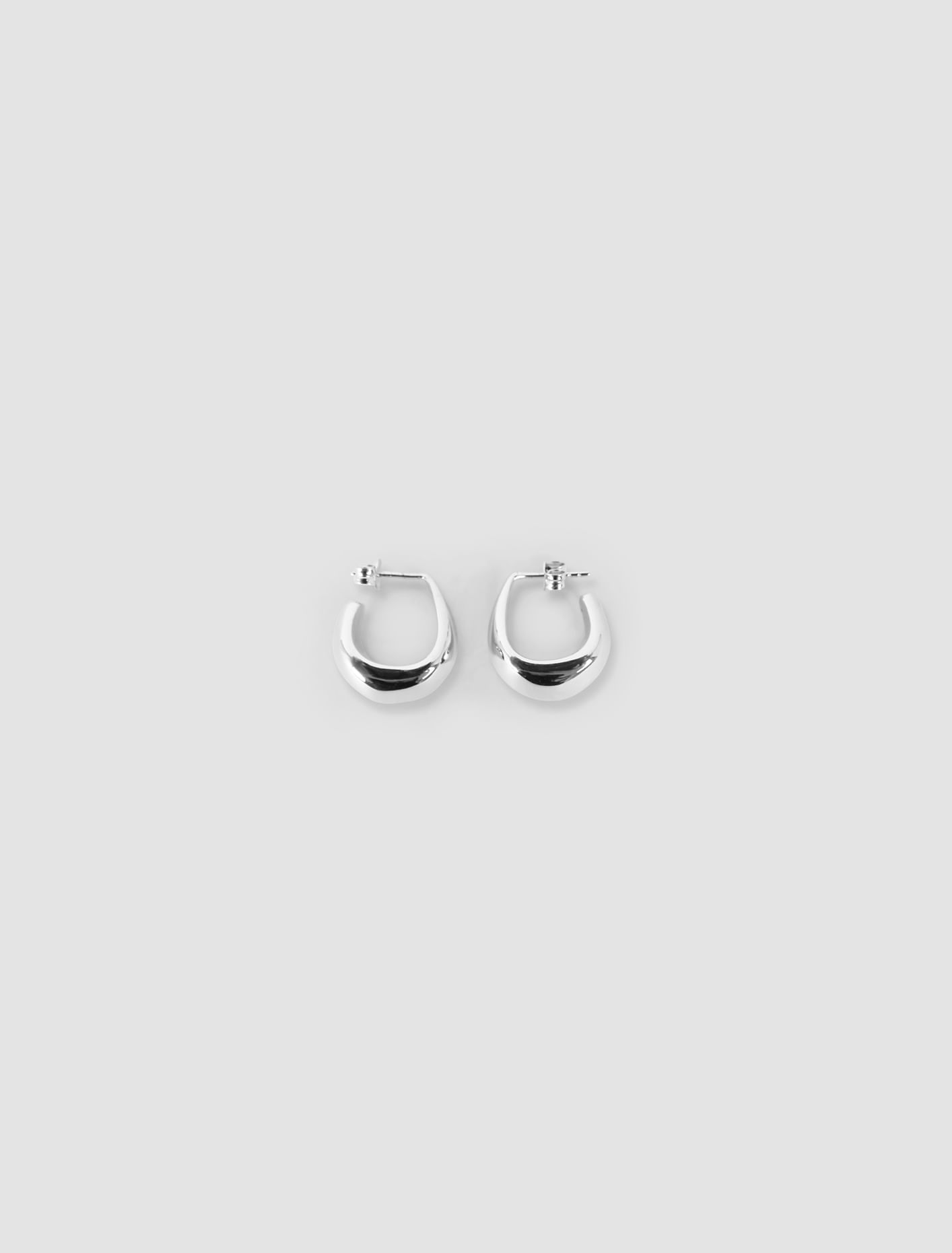 Shop Lemaire Curved Mini Drop Earrings In Argento